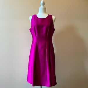 A beautiful purple dress. Midi length.